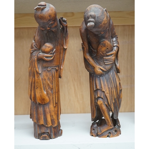 1254 - Two 19th century Chinese bamboo root figures of a fisherman and Shou Lao, tallest 32cm. Condition - ... 