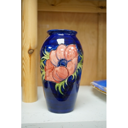 1255 - A Moorcroft anemone pattern vase, 18.5cm tall. Condition - good