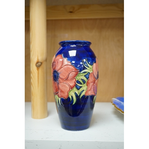 1255 - A Moorcroft anemone pattern vase, 18.5cm tall. Condition - good