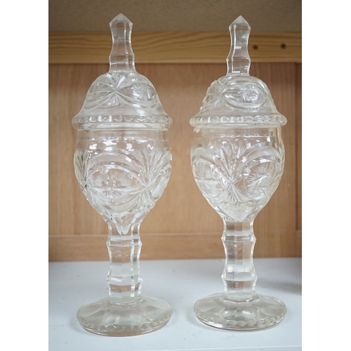 1262 - A pair of Bohemian glass sweetmeat vases and covers, 31cm. Condition - fair