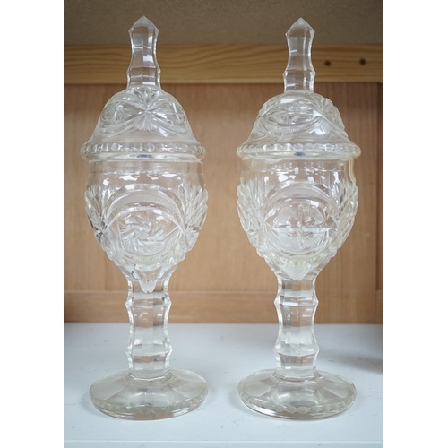 1262 - A pair of Bohemian glass sweetmeat vases and covers, 31cm. Condition - fair