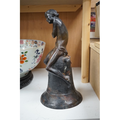 1269 - After Henri Pernot (1859-1937), a bronze figure of a boy seated on a bell, signed, 38cm high. Condit... 