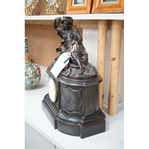 1276 - A Victorian black marble eight day mantel clock, surmounted by a cast bronze figure of a muse, with ... 