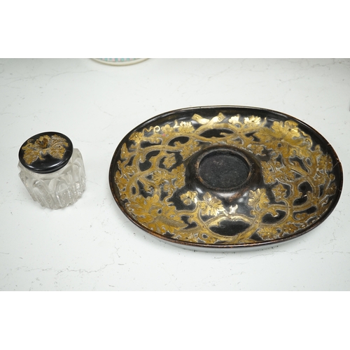 1280 - A Victorian ebonised and brass overlaid inkstand with cut glass ink well, 27cm wide. Condition - poo... 