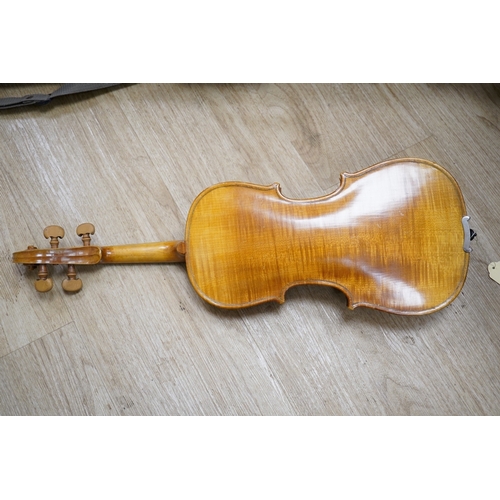 1286 - Two cased three quarter size violins, one labelled the London violin Co Ltd, length of back 33.5cm. ... 