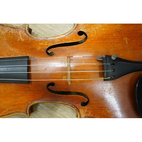 1286 - Two cased three quarter size violins, one labelled the London violin Co Ltd, length of back 33.5cm. ... 