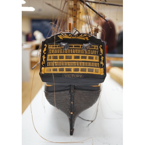 1289 - A large model of a rigged ship, 84cm long. Condition - fair