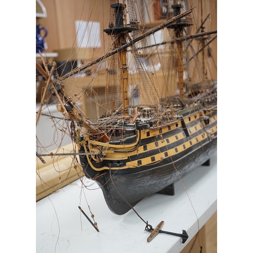 1289 - A large model of a rigged ship, 84cm long. Condition - fair