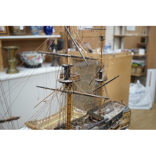 1289 - A large model of a rigged ship, 84cm long. Condition - fair