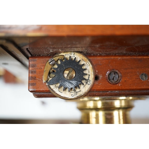 1291 - A late 19th/early 20th century brass and mahogany half plate bellows camera with a lens and a shutte... 