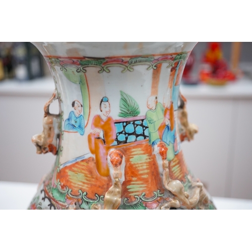 1297 - A 19th century Chinese famille rose vase, 33.5cm. Condition - poor to fair