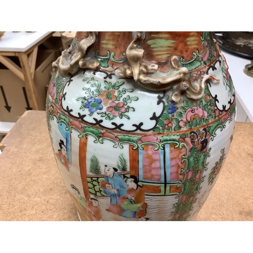 1297 - A 19th century Chinese famille rose vase, 33.5cm. Condition - poor to fair