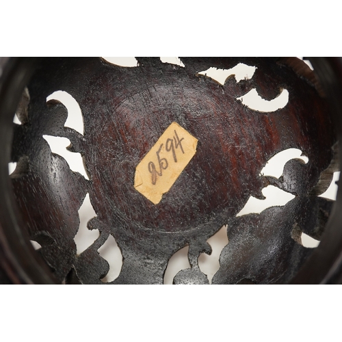 1298 - A Chinese hongmu cover, late Qing, 19cm diameter. Condition - good