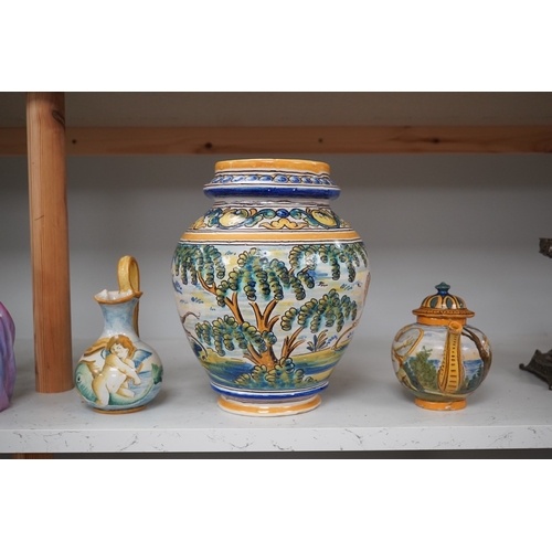 1305 - An Italian maiolica teapot and jug and a Talavera maiolica vase, 25cm high (3). Condition - jar good... 