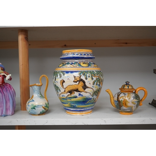 1305 - An Italian maiolica teapot and jug and a Talavera maiolica vase, 25cm high (3). Condition - jar good... 