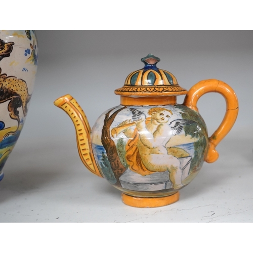 1305 - An Italian maiolica teapot and jug and a Talavera maiolica vase, 25cm high (3). Condition - jar good... 