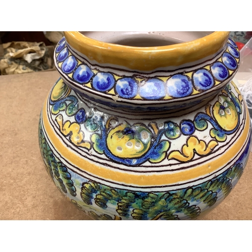 1305 - An Italian maiolica teapot and jug and a Talavera maiolica vase, 25cm high (3). Condition - jar good... 