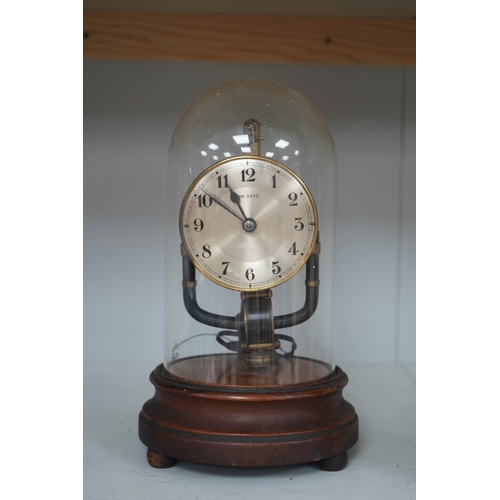 1309 - A Bulle type 800 day electric clock, under a glass dome, 26cm high. Condition - fair, untested... 