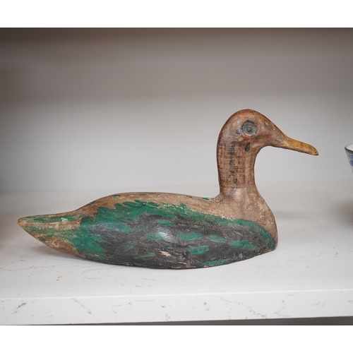 1311 - A 19th century painted decoy duck, 31cm long. Condition - worn