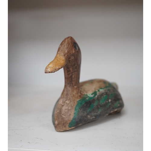 1311 - A 19th century painted decoy duck, 31cm long. Condition - worn