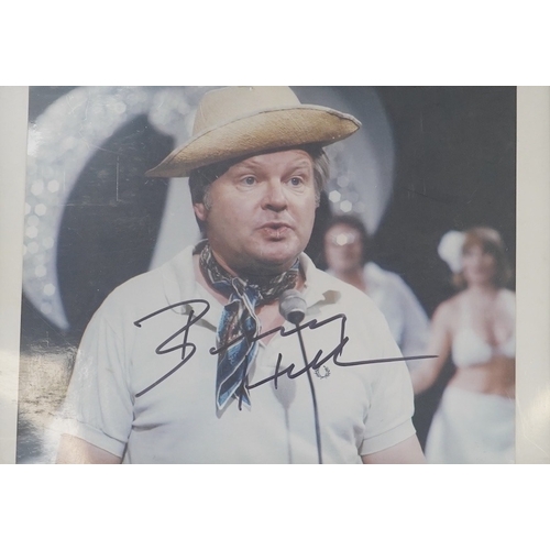 1314 - A signed photograph of Benny Hill, framed. Condition - good