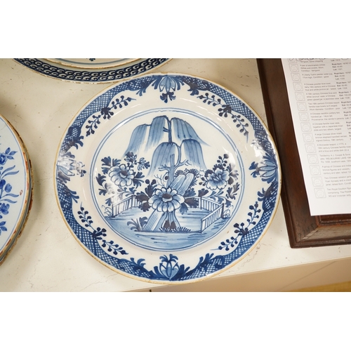 1323 - Five 18th century Delft dishes, largest 36.5cm diameter. Condition - poor to fair