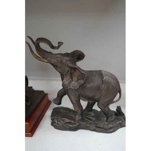 1324 - A Franklin Mint bronzed figure of an elephant, 'Giant of the Serengeti', and a Franklin Mint bronzed... 