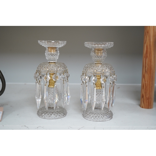 1331 - A pair of Victorian cut glass and gilt metal table lustres, 21.5cm. Condition- minor nicks