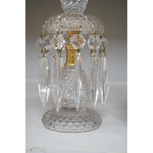 1331 - A pair of Victorian cut glass and gilt metal table lustres, 21.5cm. Condition- minor nicks