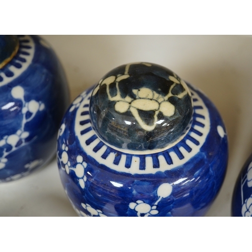 1332 - Eight Chinese blue and white ginger jars, one prunus vase and two others, the vase 25cm high. Condit... 