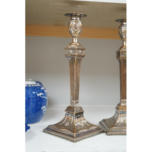 1333 - A pair of Adam design silver plated candlesticks, 31.5cm. Condition - worn otherwise good