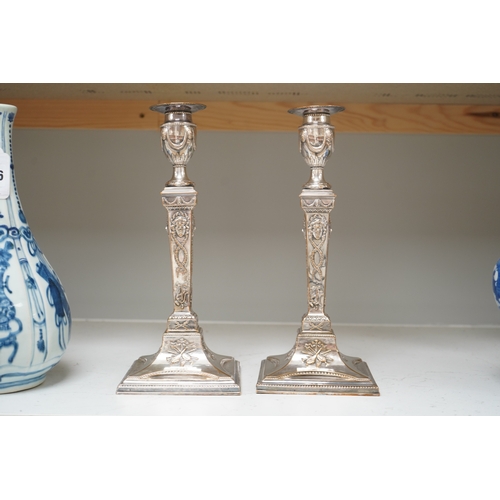 1337 - A pair of Adam design silver plated candlesticks, 29cm. Condition - worn