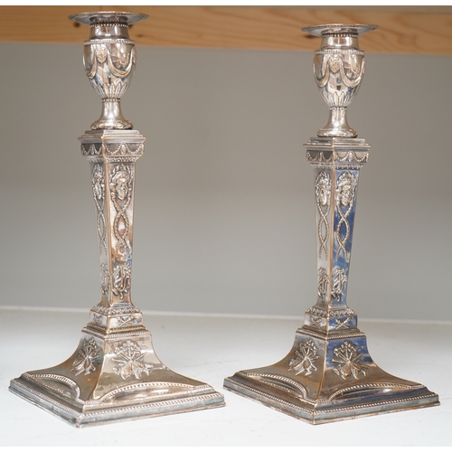 1337 - A pair of Adam design silver plated candlesticks, 29cm. Condition - worn