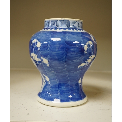 1338 - A 19th century Chinese blue and white 'prunus' vase, a Chinese green glazed jar, a Japanese vase and... 