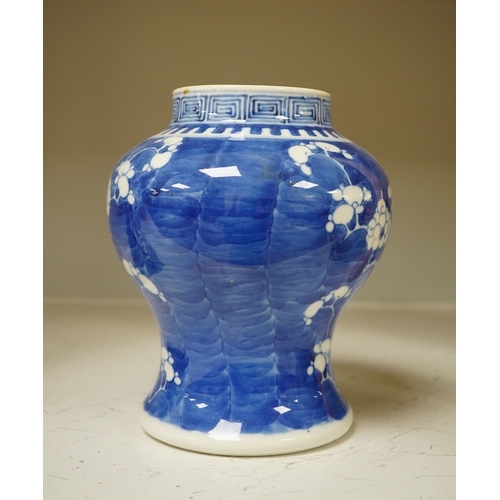 1338 - A 19th century Chinese blue and white 'prunus' vase, a Chinese green glazed jar, a Japanese vase and... 