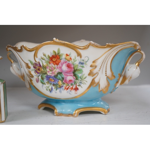 1339 - A Sevres style flower painted navette shaped jardiniere and a similar French scent bottle and stoppe... 