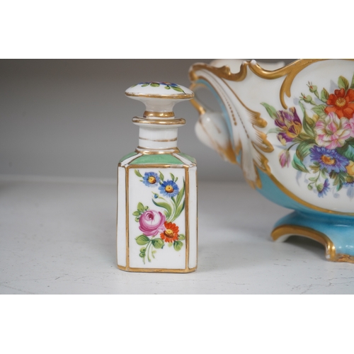 1339 - A Sevres style flower painted navette shaped jardiniere and a similar French scent bottle and stoppe... 