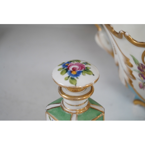 1339 - A Sevres style flower painted navette shaped jardiniere and a similar French scent bottle and stoppe... 