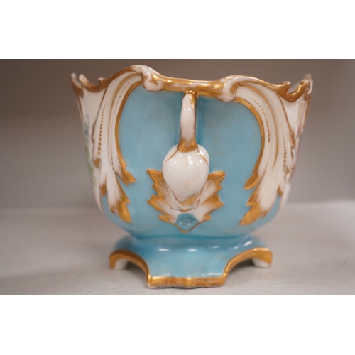 1339 - A Sevres style flower painted navette shaped jardiniere and a similar French scent bottle and stoppe... 