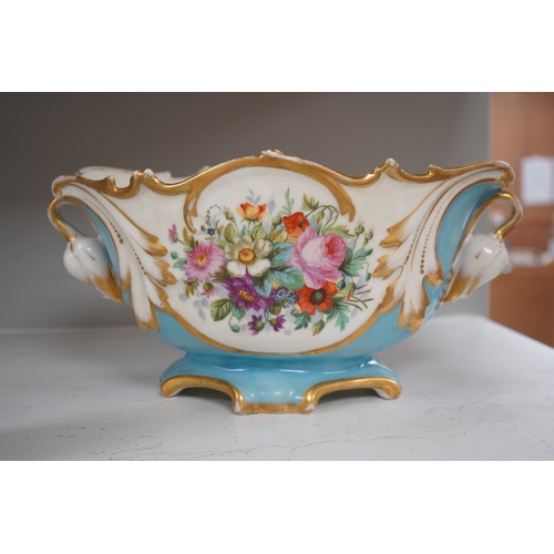 1339 - A Sevres style flower painted navette shaped jardiniere and a similar French scent bottle and stoppe... 