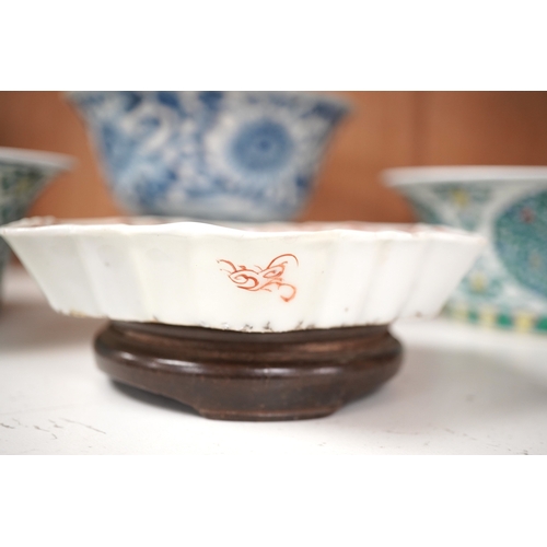 1361 - A Chinese blue and white bowl, Kangxi, 15cm. diam., a famille rose teapot stand, Yongzheng, and two ... 