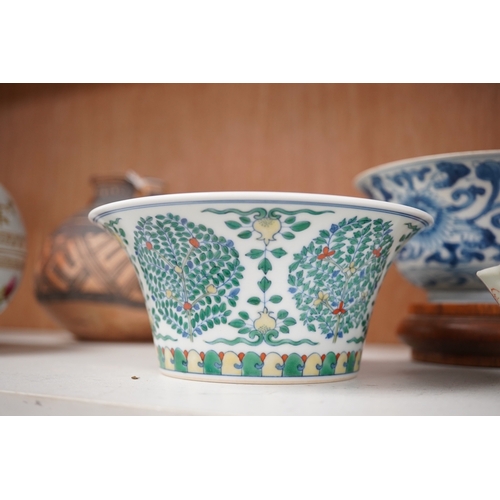 1361 - A Chinese blue and white bowl, Kangxi, 15cm. diam., a famille rose teapot stand, Yongzheng, and two ... 