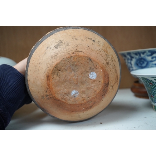 1362 - A Chinese neolithic pottery two handled jar - 14cm tallProvenance: the vendors parents lived in Hon... 