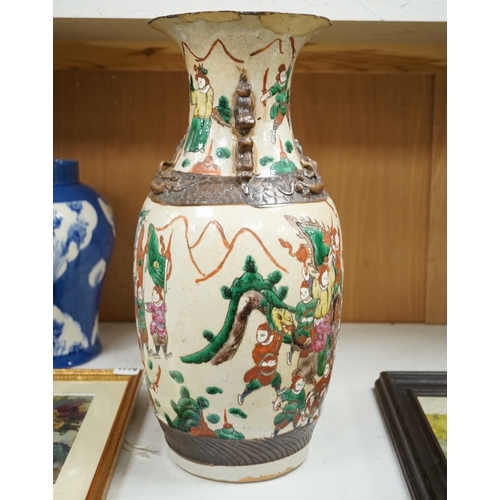 1375 - A Chinese crackleglaze famille rose  'Warriors' vase, early 20th century, 44cm high. Condition - poo... 