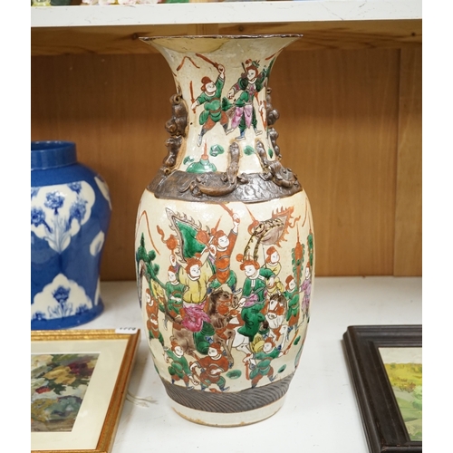 1375 - A Chinese crackleglaze famille rose  'Warriors' vase, early 20th century, 44cm high. Condition - poo... 