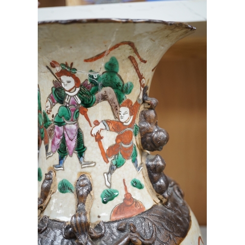 1375 - A Chinese crackleglaze famille rose  'Warriors' vase, early 20th century, 44cm high. Condition - poo... 