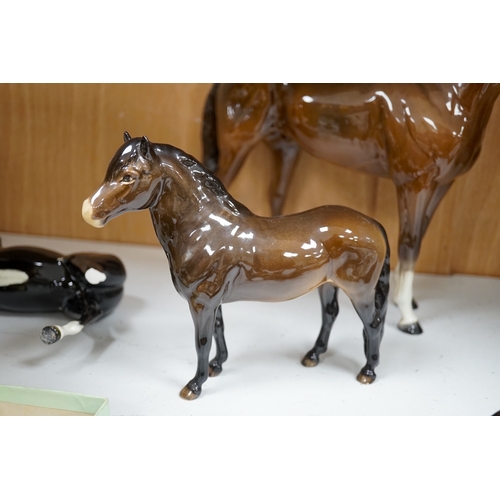 1378 - A large Beswick Chestnut horse, together with three other smaller horses and an Exmoor pony, tallest... 