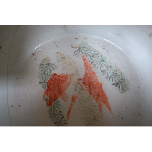 1379 - A Chinese famille rose goldfish bowl, Guangxu period, 25cm high. Condition - repaired