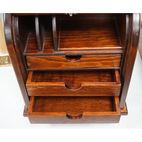 1385 - A tambour fronted stationery rack, 30cm high. Condition - fair