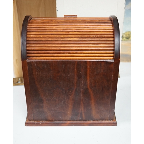 1385 - A tambour fronted stationery rack, 30cm high. Condition - fair